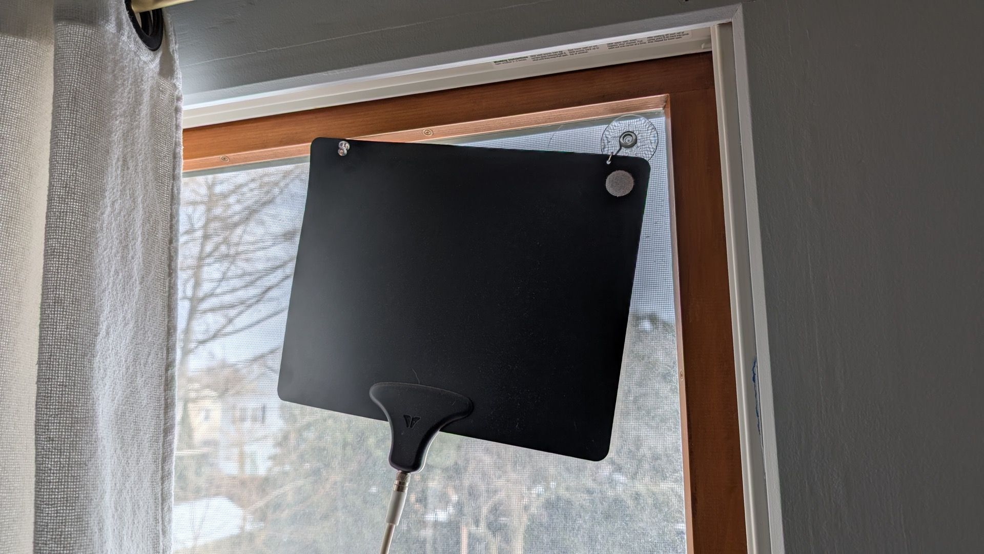 Mohu Leaf indoor antenna in a window.