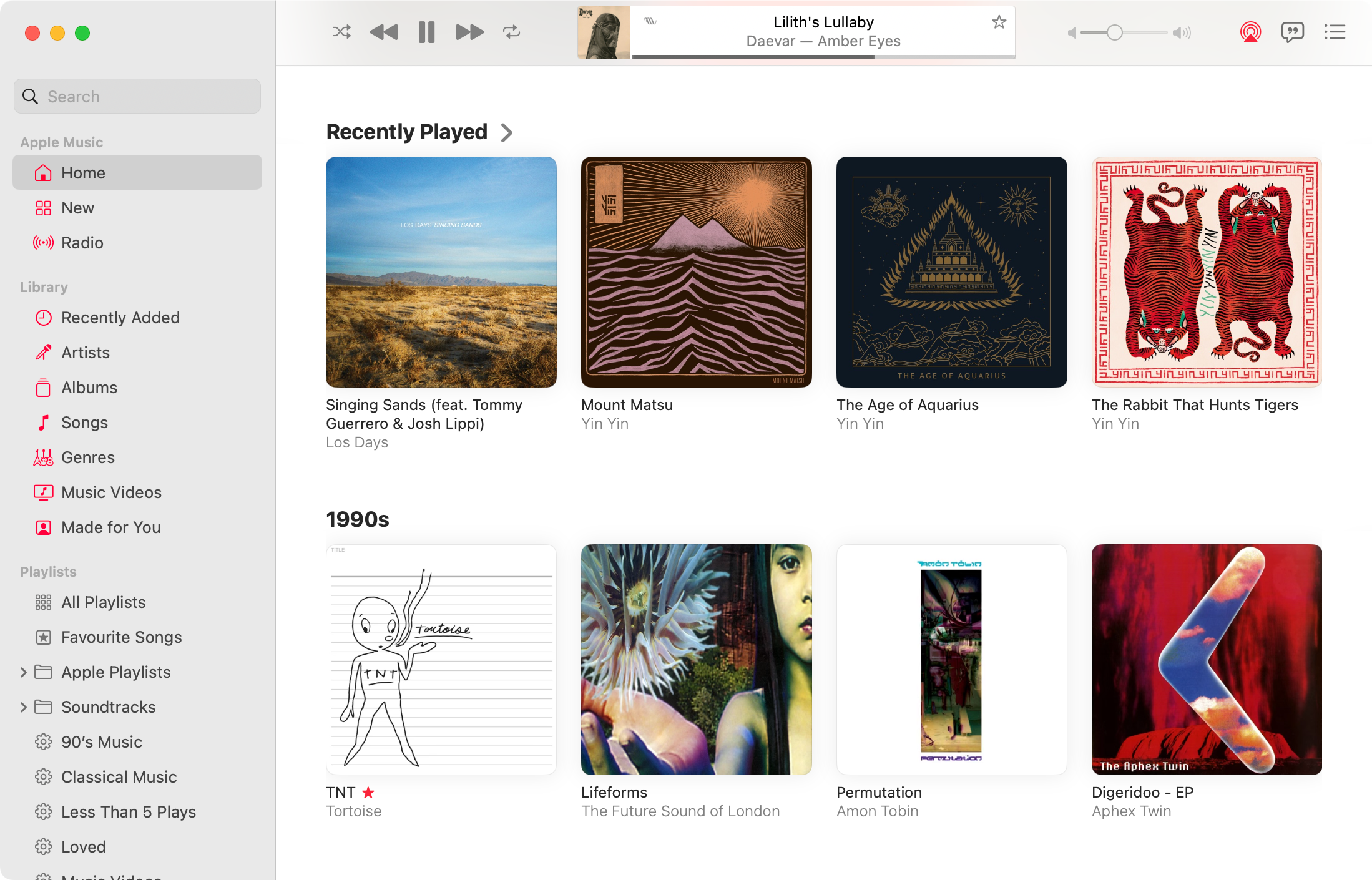 Recently Played and 1990s sections on the Apple Music Home screen.