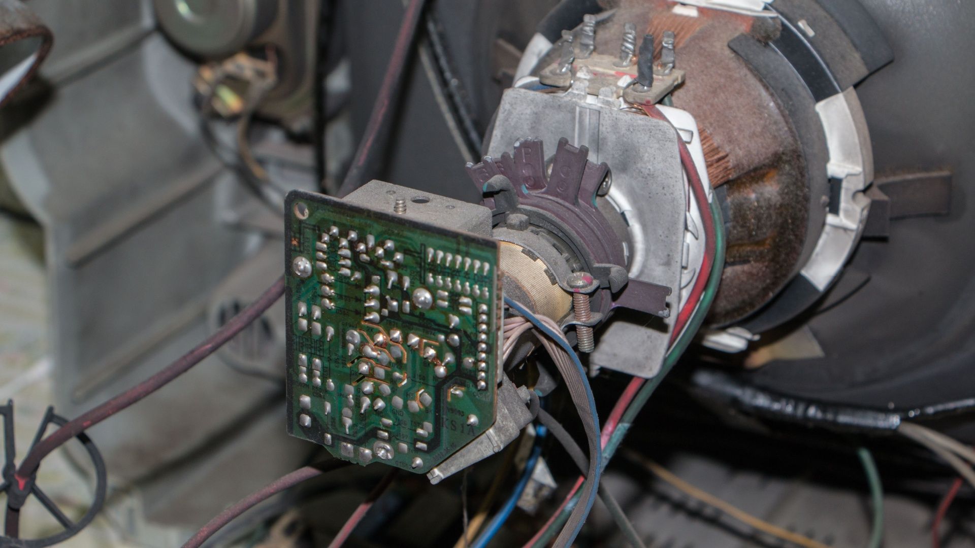 Old Television electronics detail of dusty inside of TV.