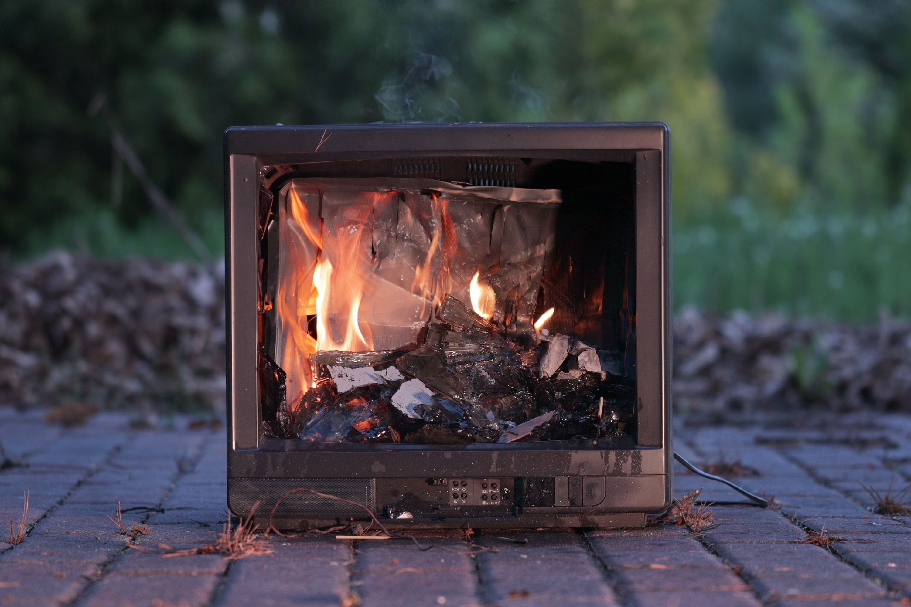 A burning CRT television.