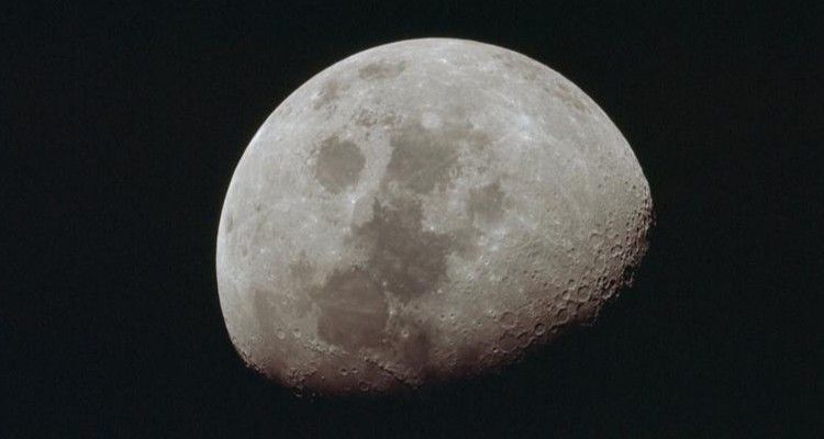 The Moon in its waning gibbous phase.