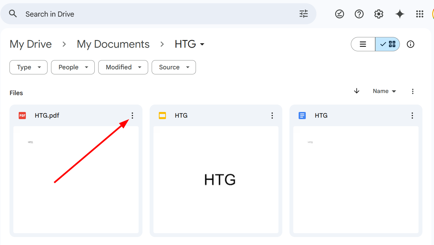 The three dots above the selected file in Google Drive.