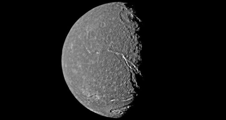 Titania, Uranus largest satellite, in the waning gibbous cycle.