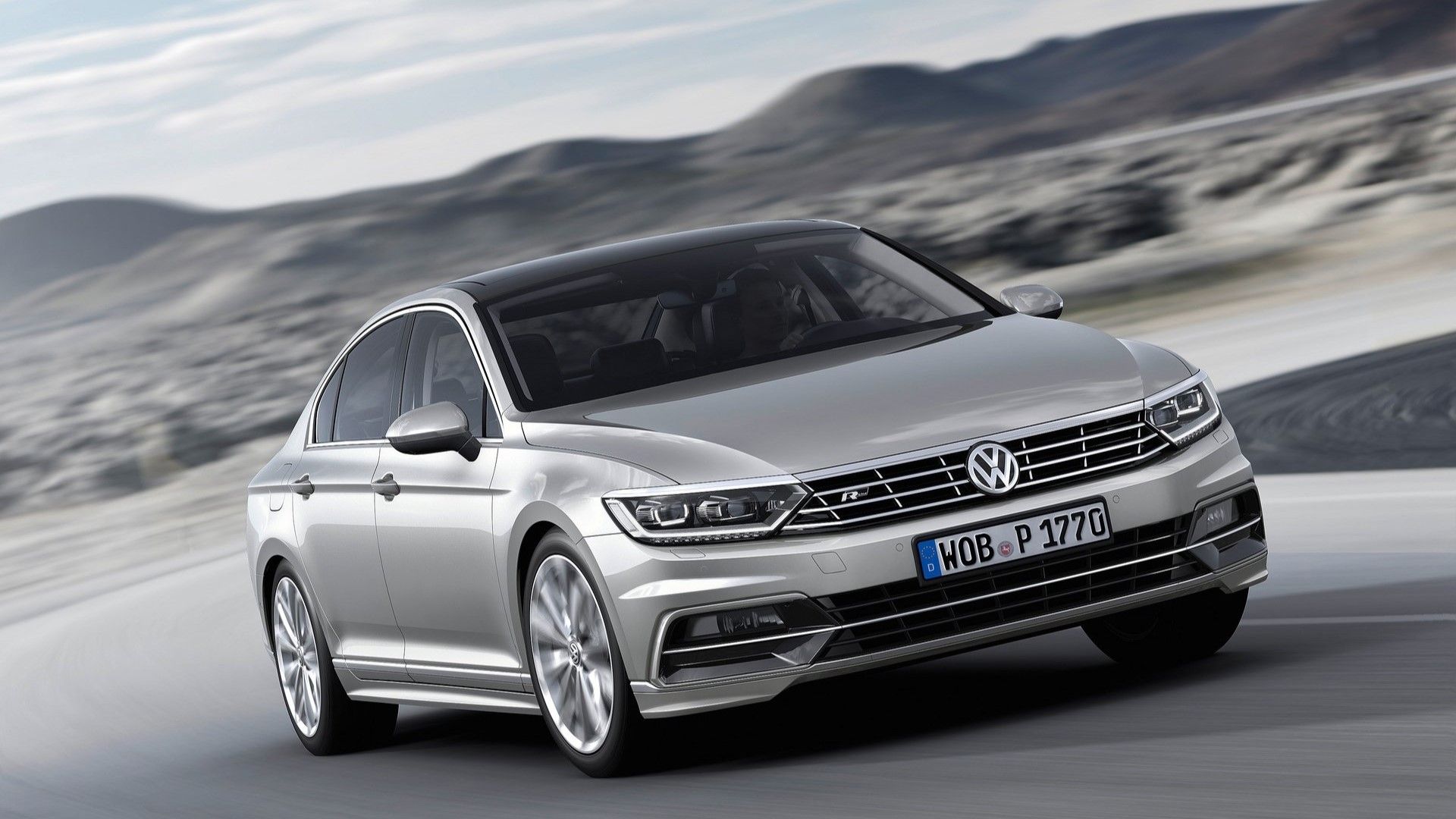 Front 3/4 action shot of a 2015 Volkswagen Passat