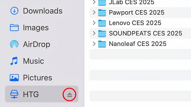 Closeup of the eject icon in the Finder's sidebar.