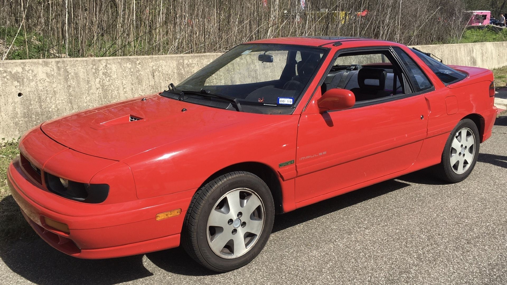 Front 3/4 shot of a 1991 Isuzu Impulse