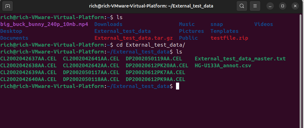 Terminal showing folder contents after navigating into an extracted directory.