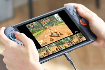 A person playing the Switch 2 in handheld mode.