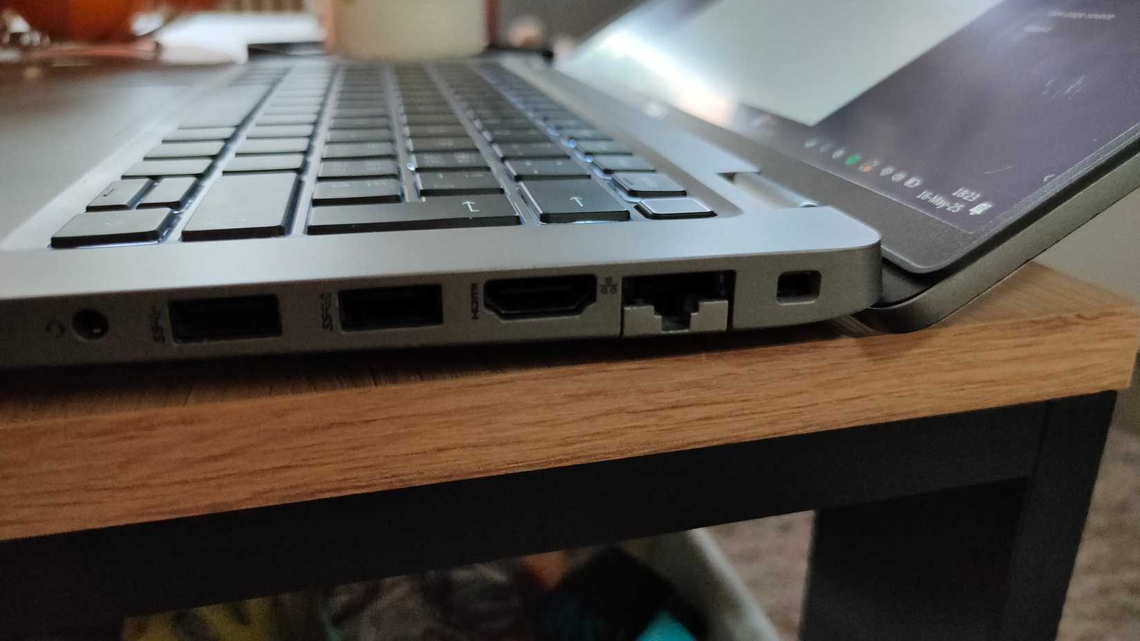 3.5mm headphone jack, two USB-A ports, an HDMI port, Ethernet, and a Kensington lock on a laptop.
