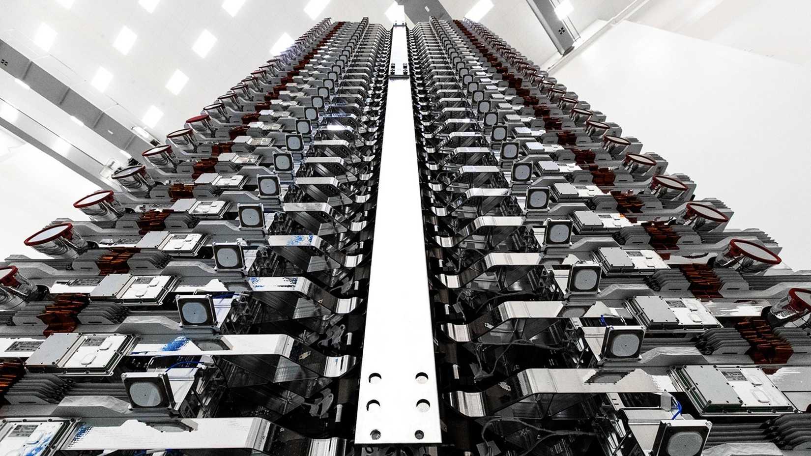 Starlink satellites in a row before they are launched into orbit.