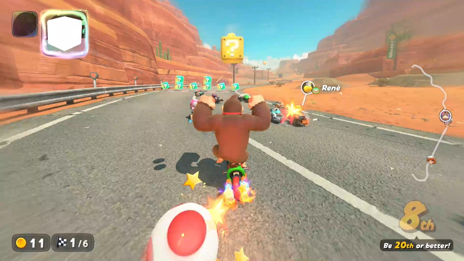 Donkey Kong using the Question Block item in Mario Kart World.