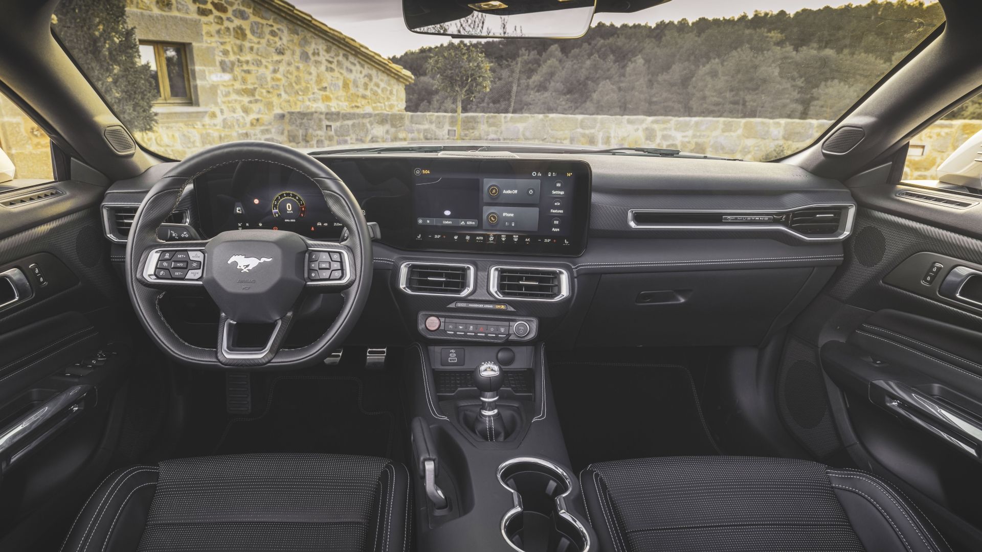 Interior shot of the dashboard in a 2024 Ford Mustang