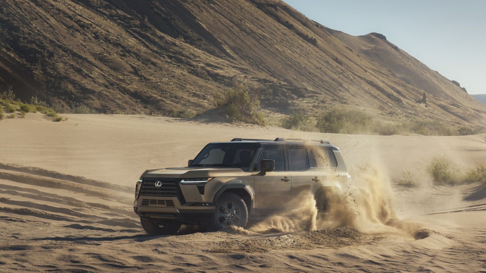 Front 3/4 action shot of a 2025 Lexus GX