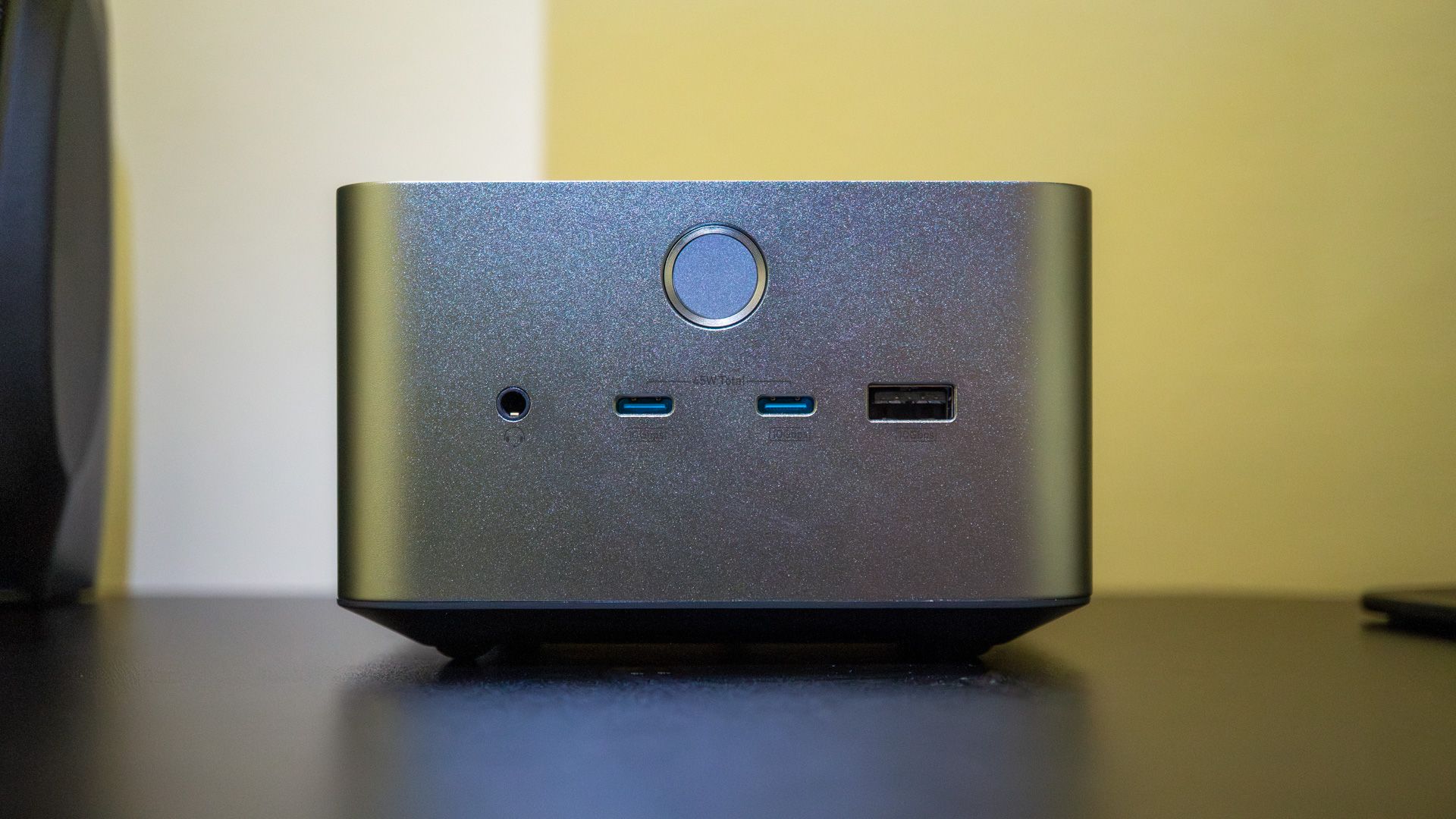 Front of Anker dock with three USB ports and a headphone jack.
