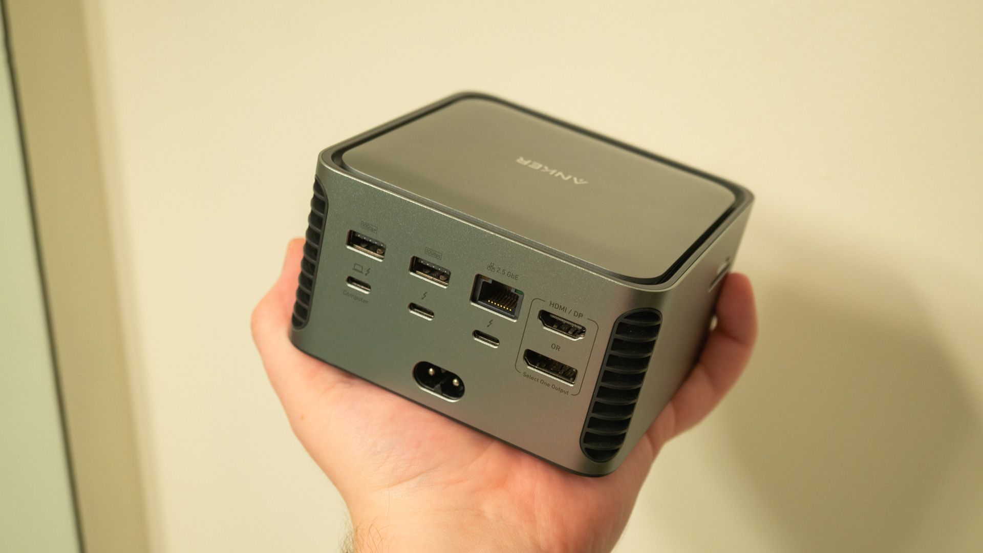 Holding the Anker Thunderbolt dock.