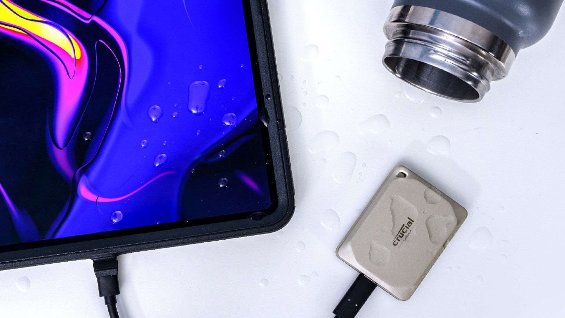 A Crucial X9 Pro for Mac External SSD connected to an iPad.