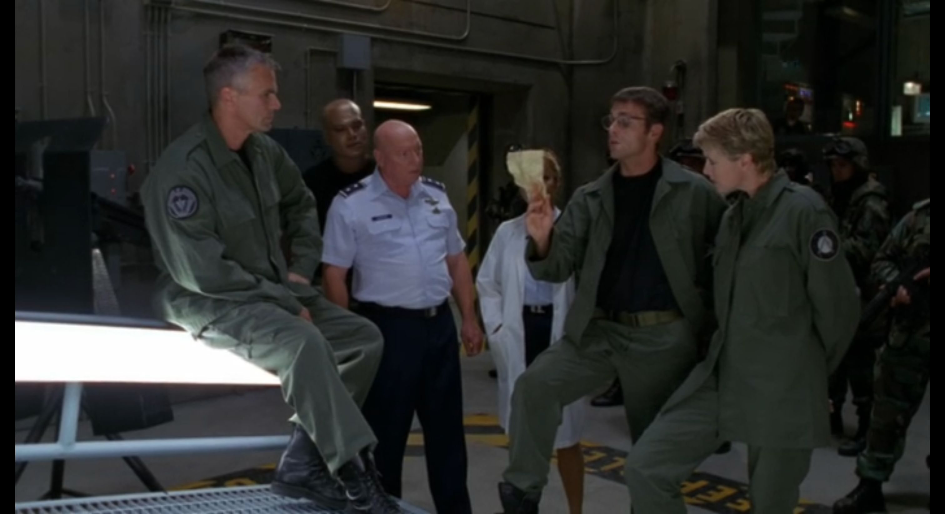 Daniel Jackson of SG-1 examines a note from the future.
