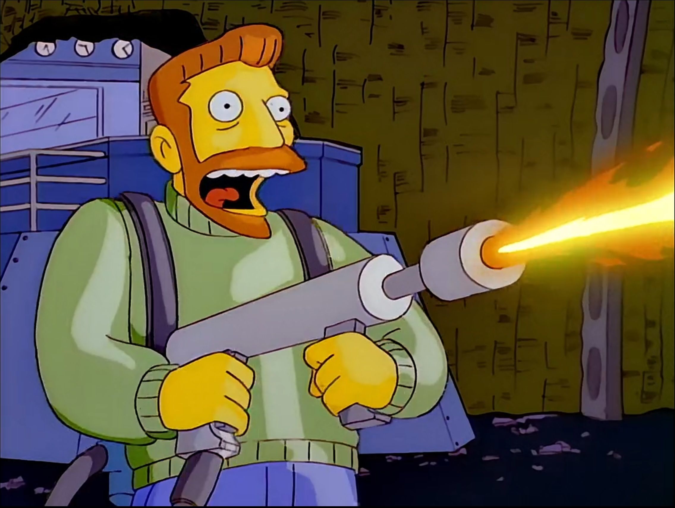 Hank Scorpio fires a flamethrower.