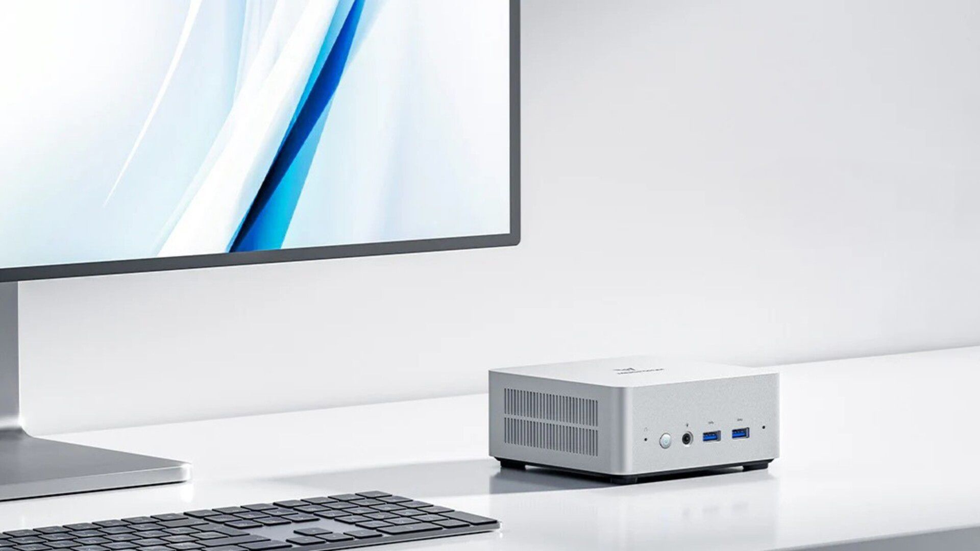A MINISFORUM UN1250 Mini PC sitting on a table 