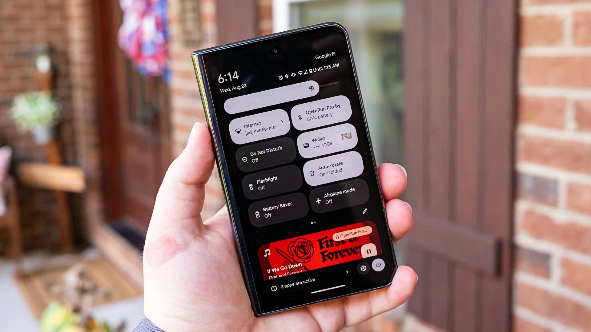 Notification shade and quick settings on the Google Pixel Fold with the phone folded close.