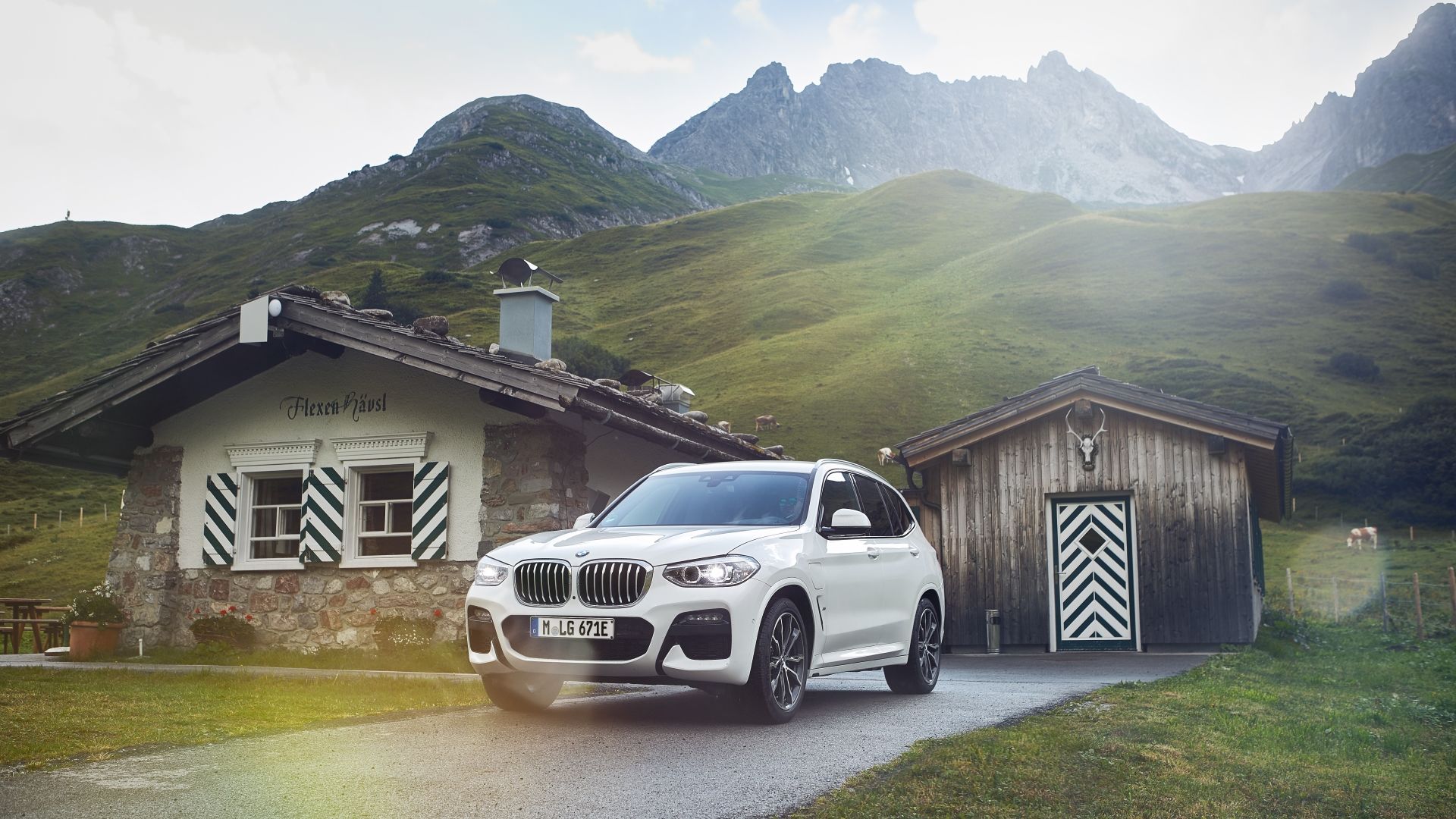 Front 3/4 shot of a 2020 BMW X3 PHEV