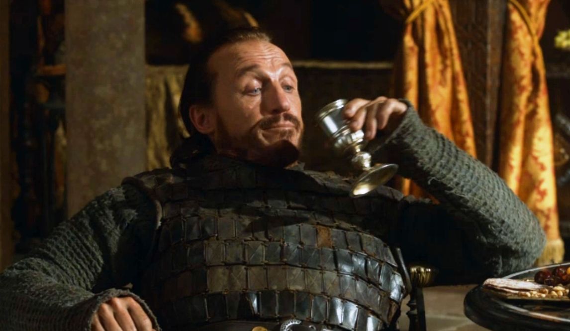 Ser Bronn from Game of Thrones enjoying some wine.