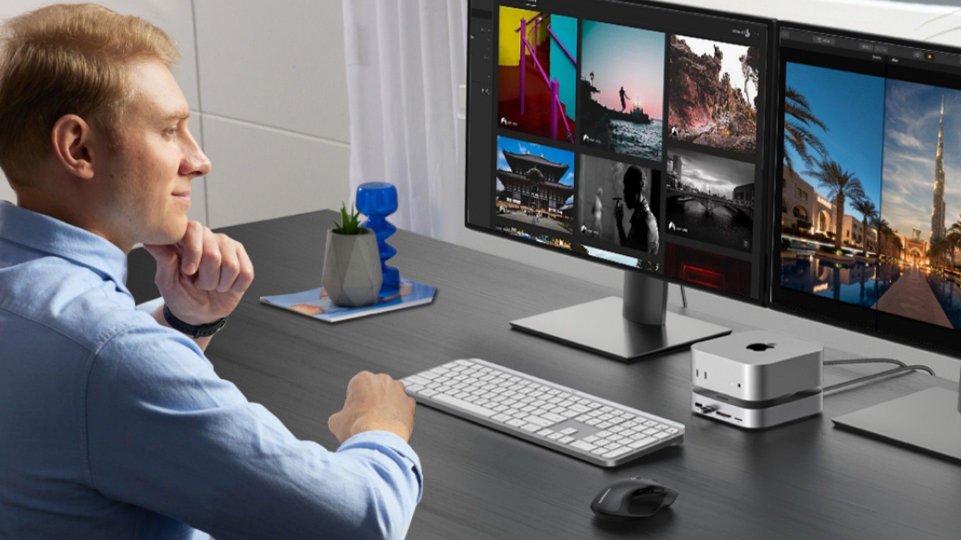 A person using an Apple M4 Mac Mini coupled with a UGREEN M4 Mac Mini Dock.
