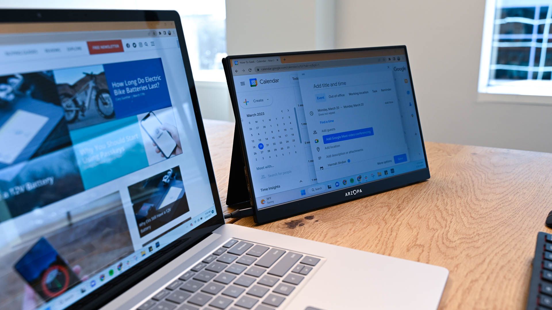 A laptop with a second screen. 