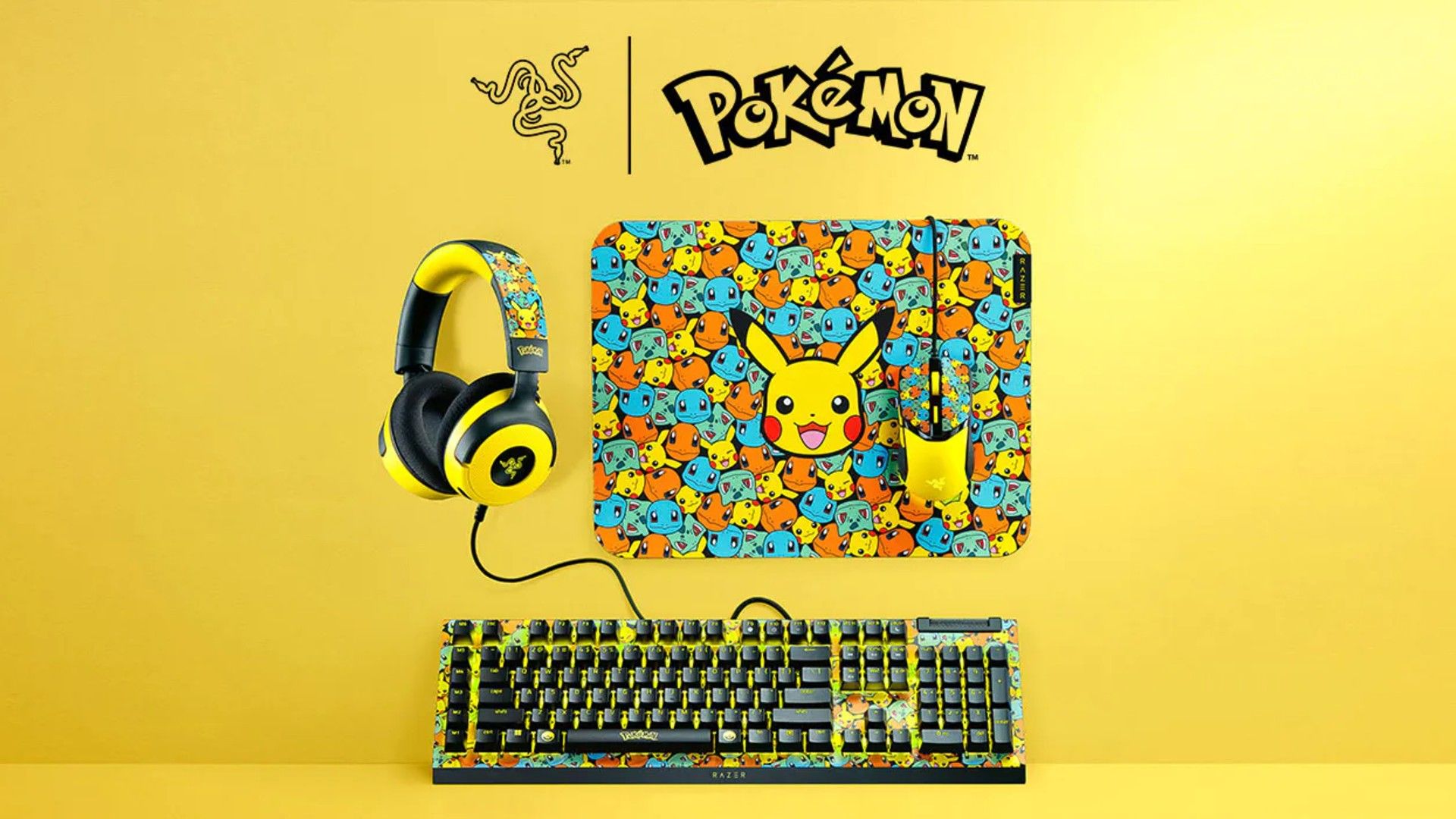 A Razer Keyboard, mouse and mousepad, and headset with Pokemon Designs on a yellow background