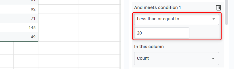 An extra condition added to Google Sheets' conditional notifications rule that triggers an email if the values in the range drop to 20 or lower.