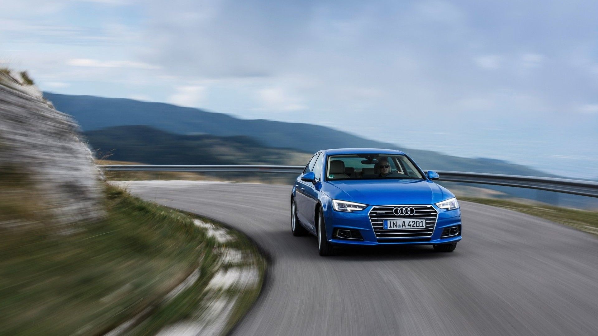 Front 3/4 action shot of a 2016 Audi A4