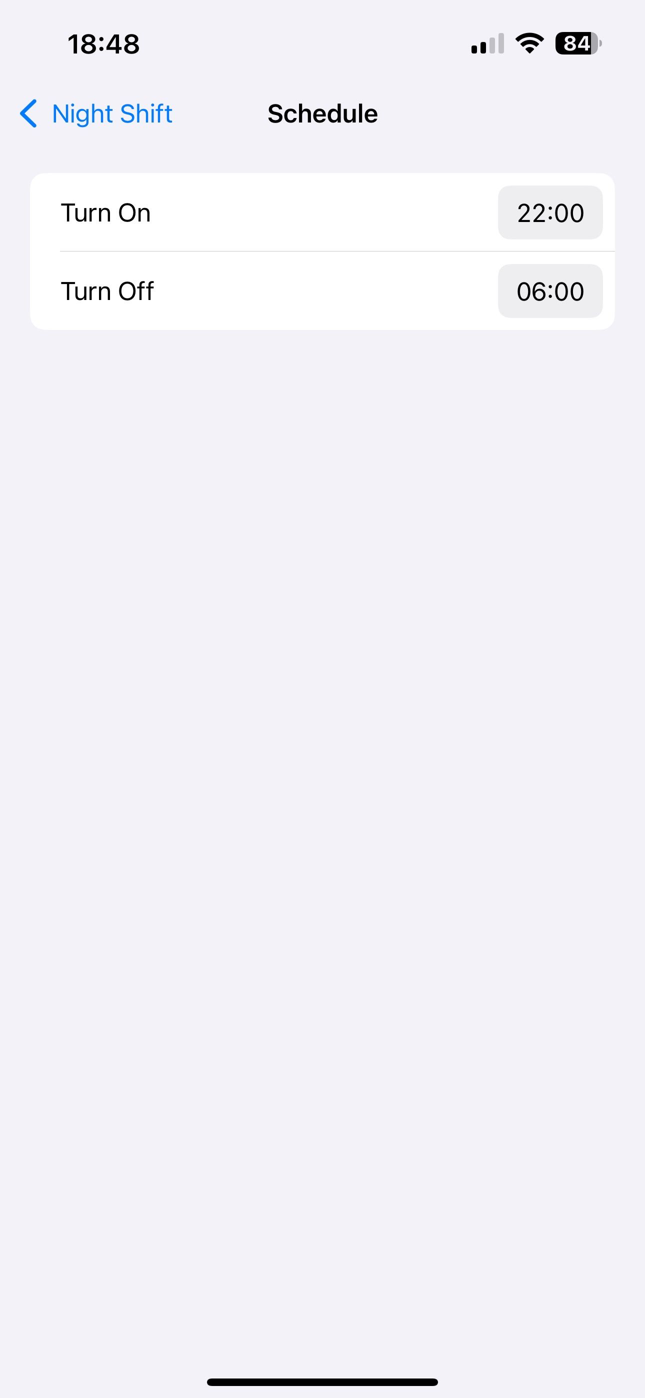 Setting up a schedule for the Night Shift feature on an iPhone.