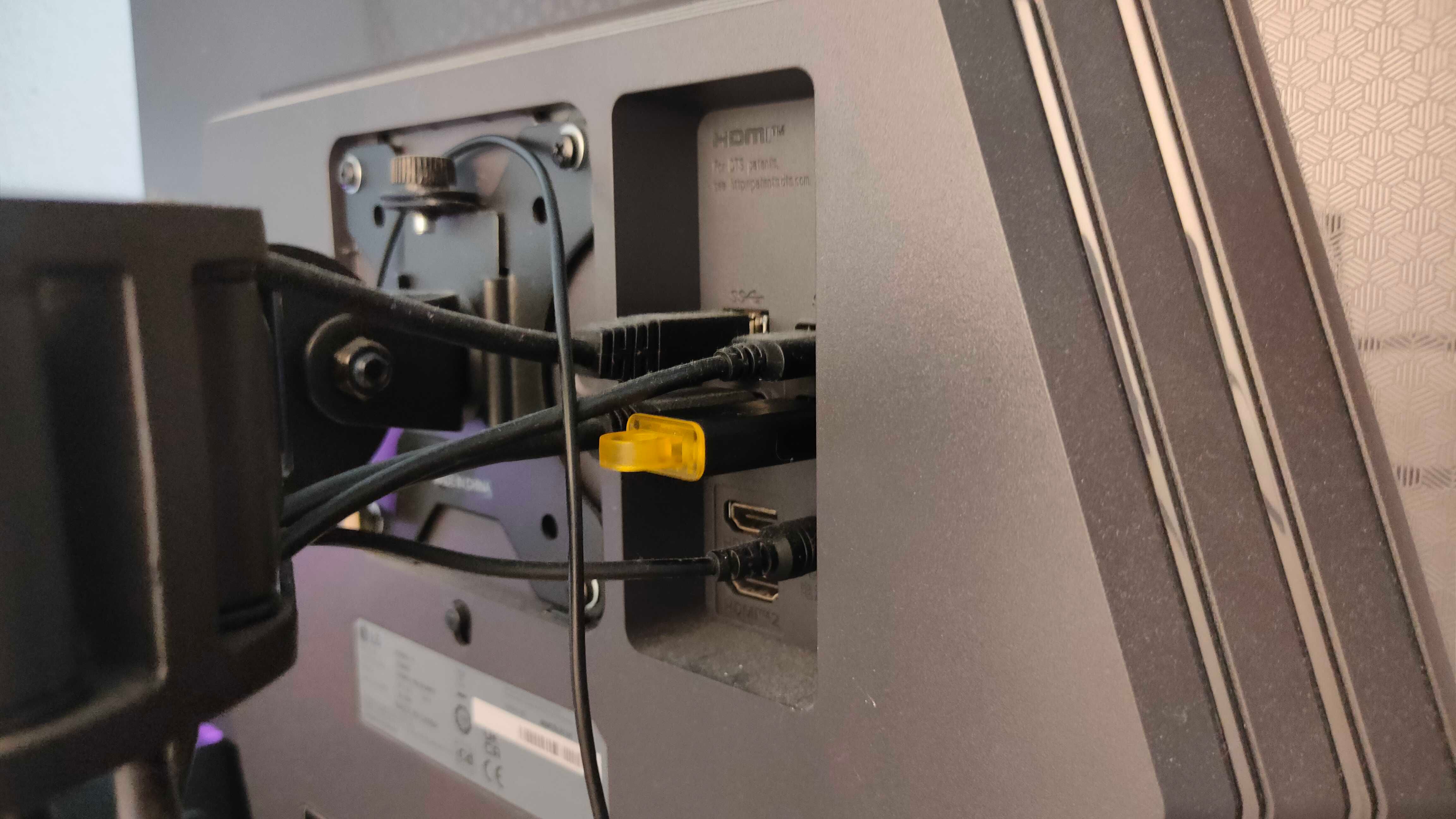 A USB flash drive plugged into monitor.