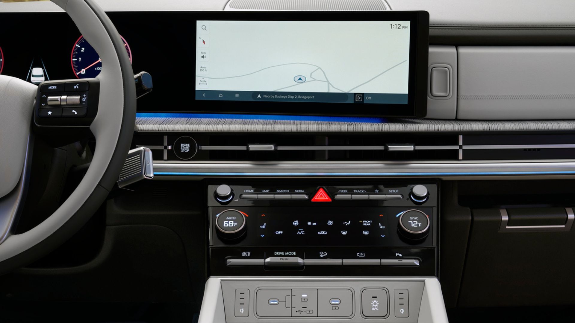 Close-up shot of the dashboard in a 2025 Hyundai Santa Fe Hybrid, showing the infotainment screen and driver controls.