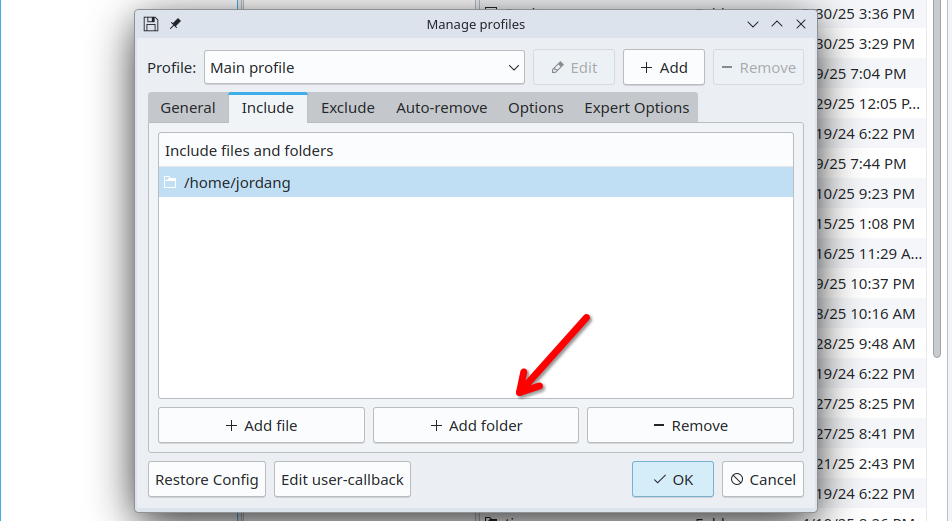 Red arrow pointing to the Add Folder button in Back in Time.