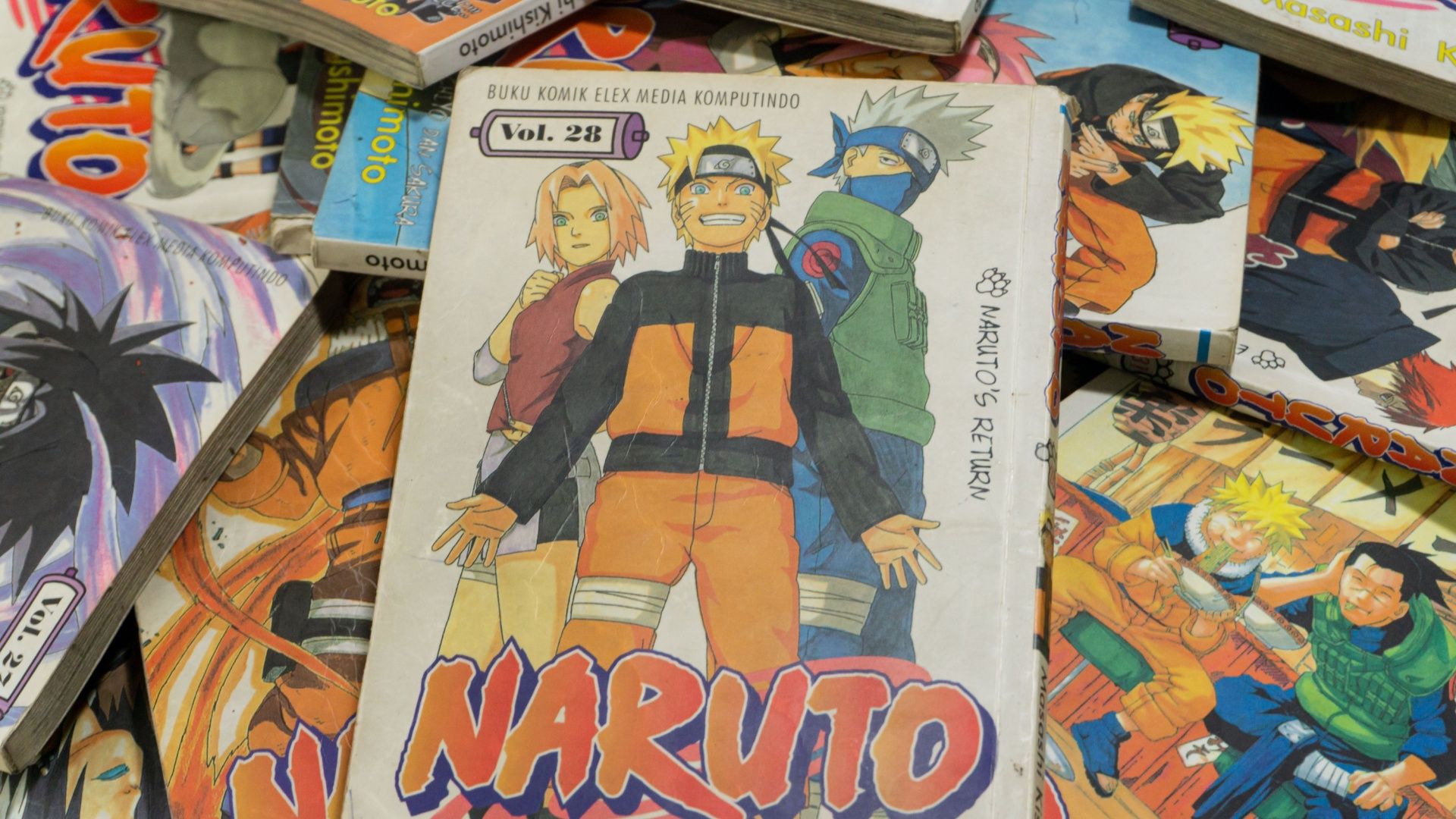 A stack of Naruto Manga