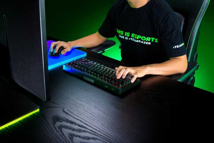 The Razer Blackwidow V4 TKL Hyperspeed being used by someone at a desk