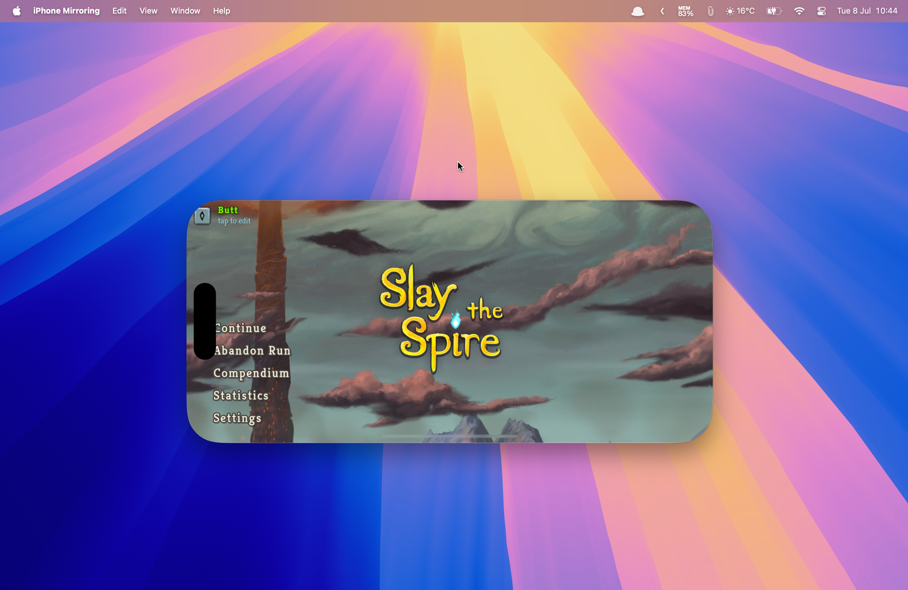 The Slay the Spire+ mobile app running in iPhone Mirroring on a Mac.