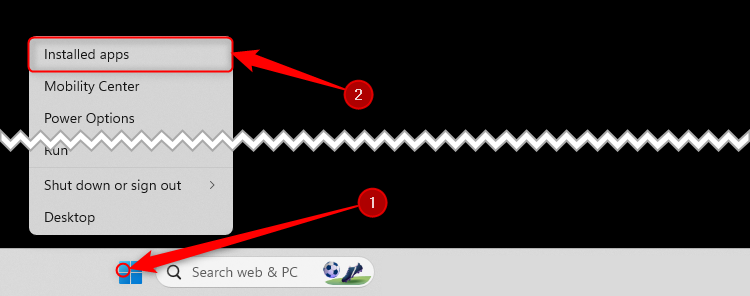 The Windows right-click menu via the Windows icon in the taskbar is expanded, and Installed Apps is selected.