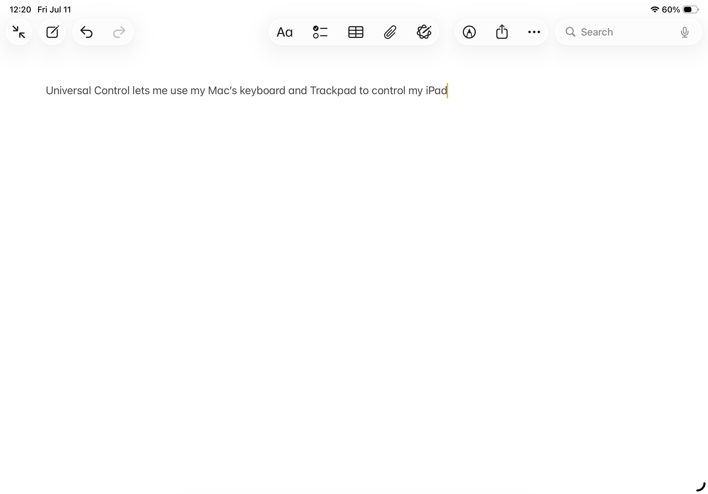Typing text in Apple Notes app on an iPad using Universal Control.