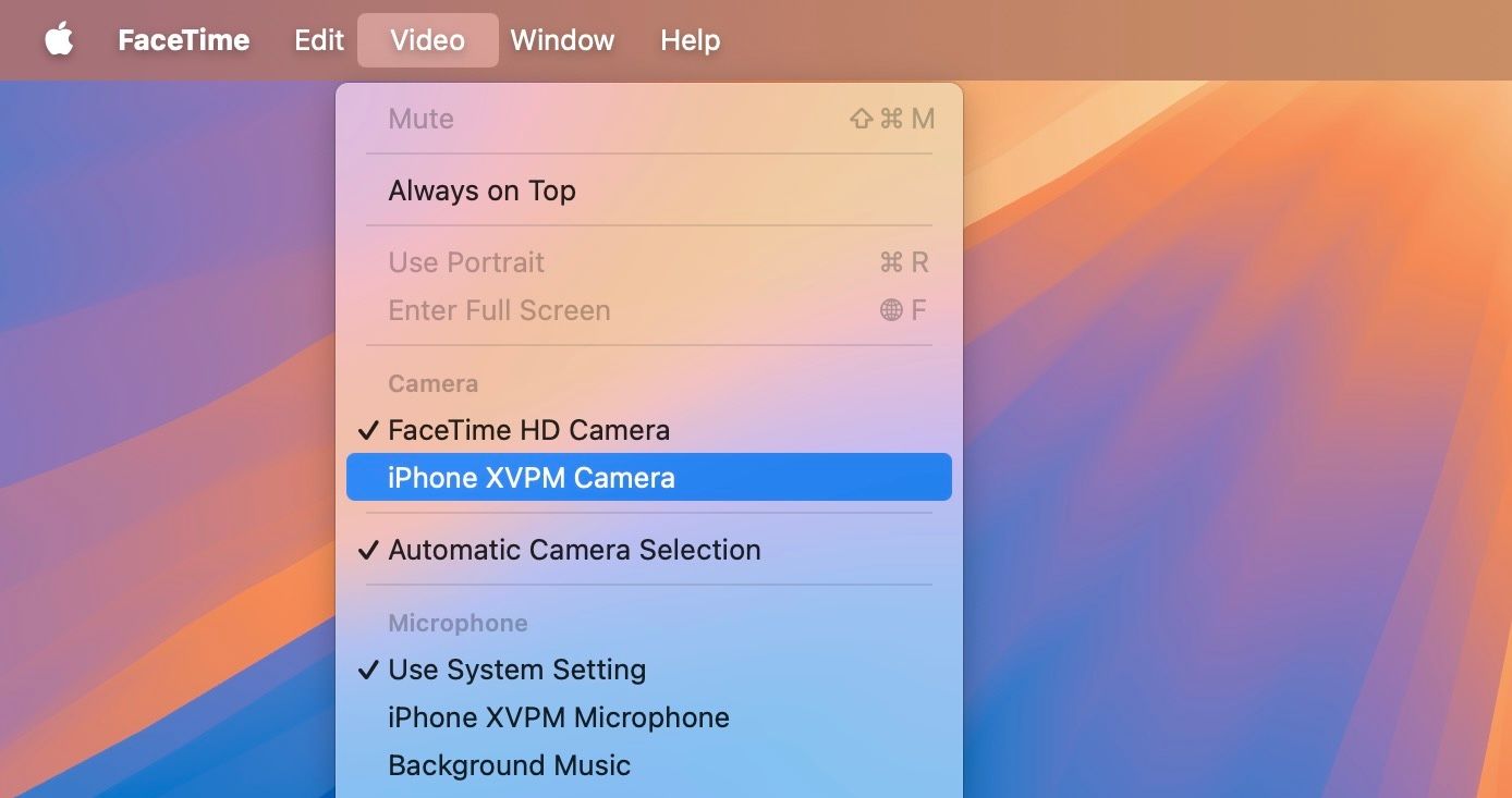 Selecting an iPhone as the source for FaceTime app on a Mac.