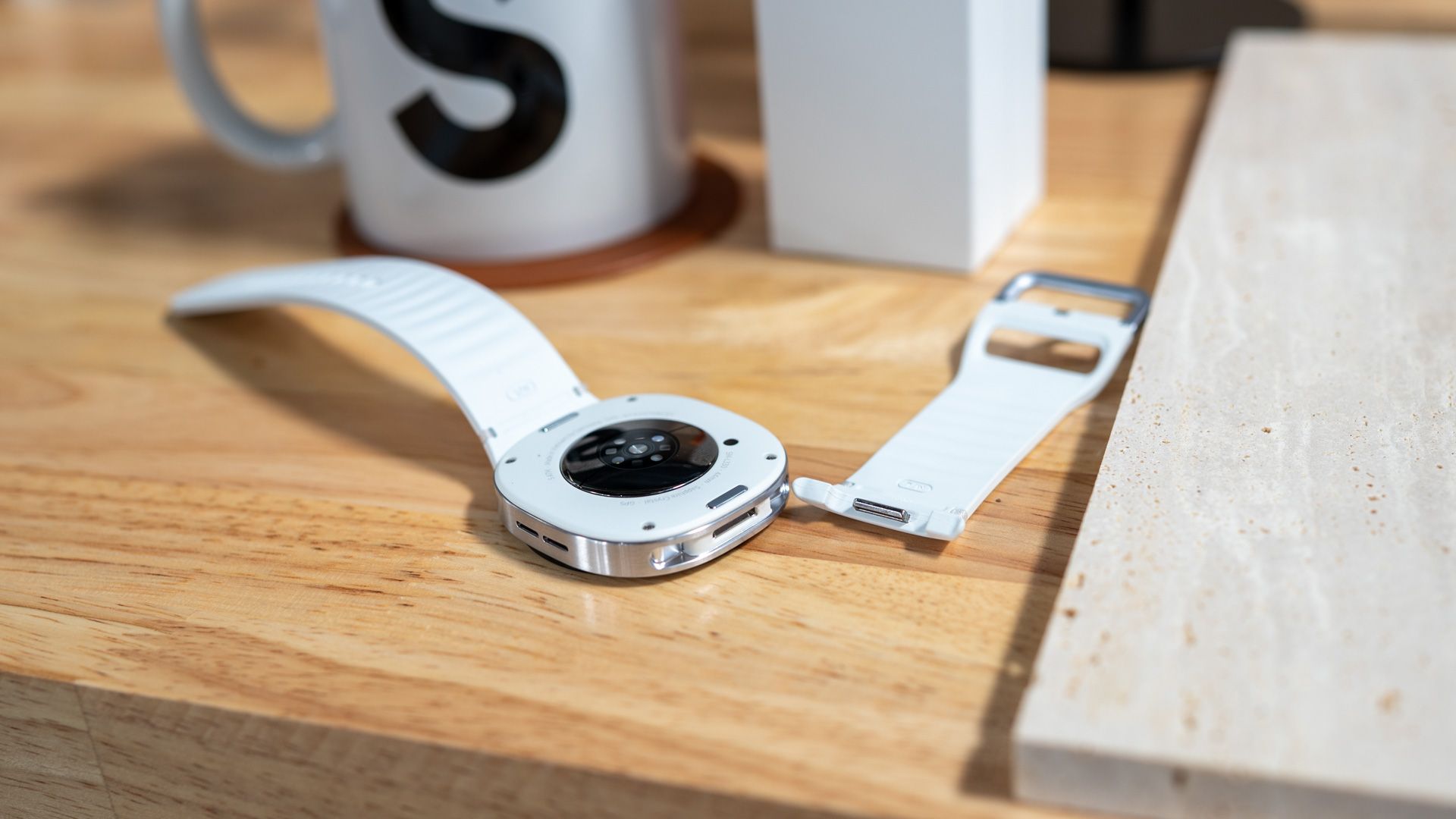 watch band removed from the samsung galaxy watch 8 clasic showing the dynamic lug system 54642292483 o-1