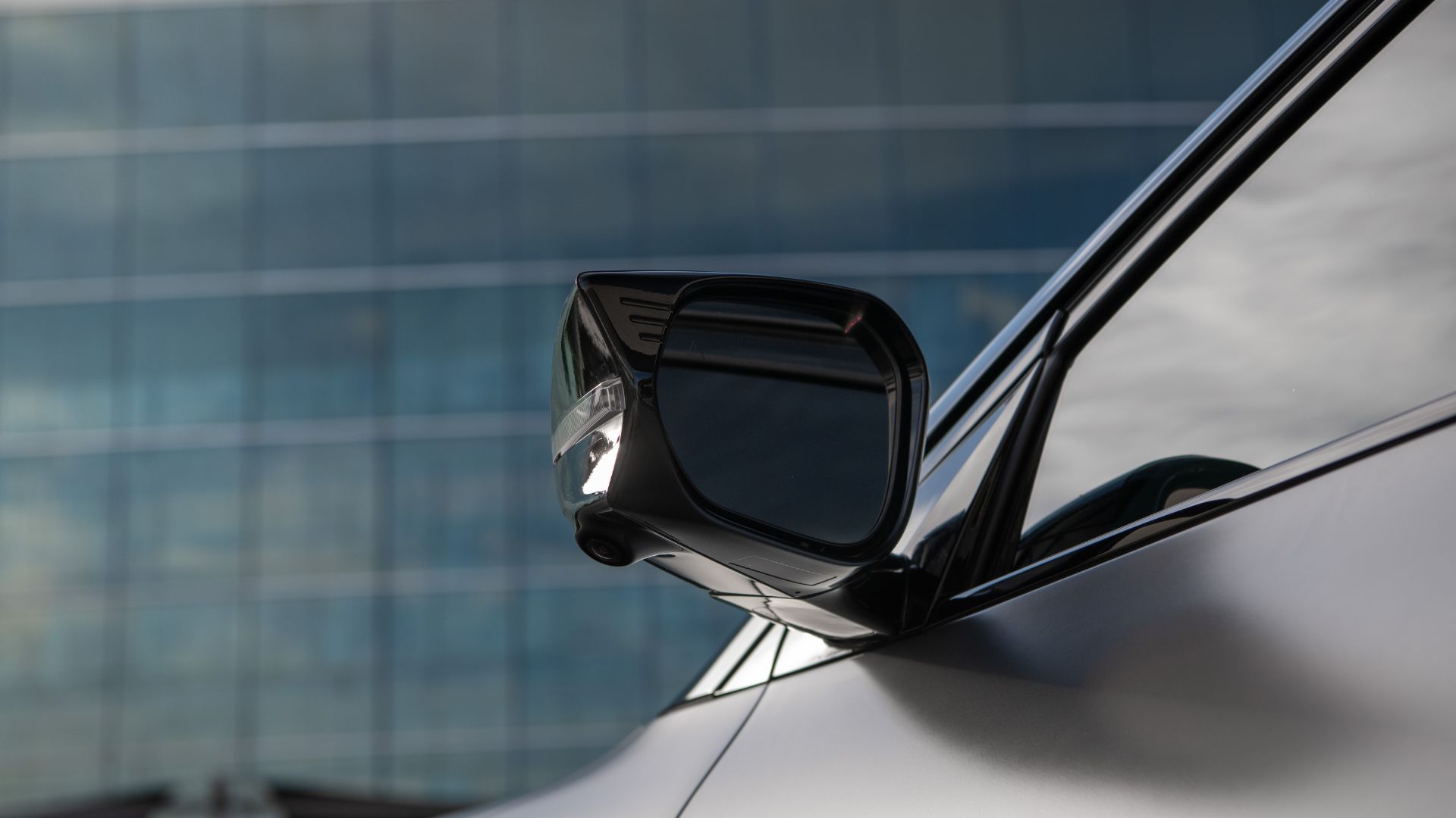 Close-up shot of the wing mirror on a gray 2022 Kia EV6.