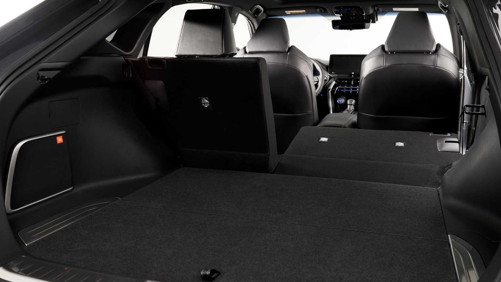 Close-up shot inside the cabin of a 2021 Toyota Venza with the rear seats folded flat.