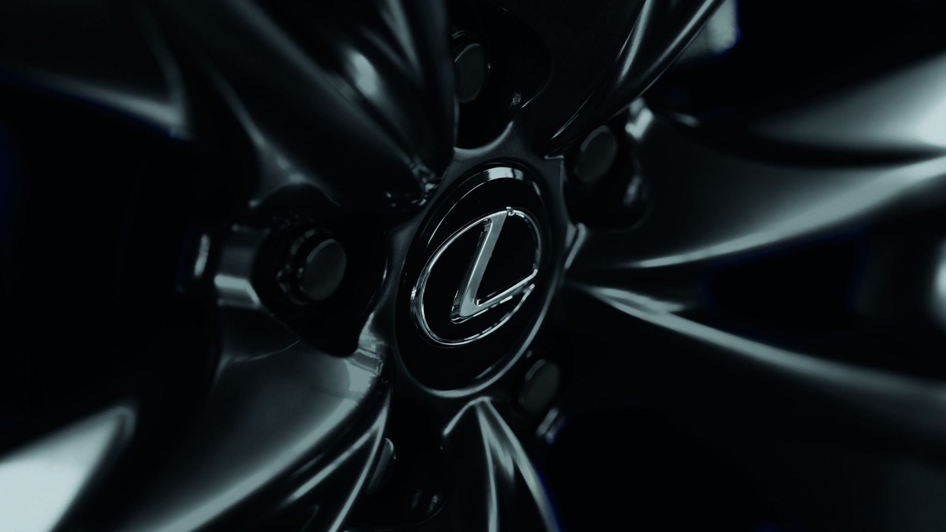 Close-up shot of the black alloy wheel on a 2024 Lexus ES 300h.