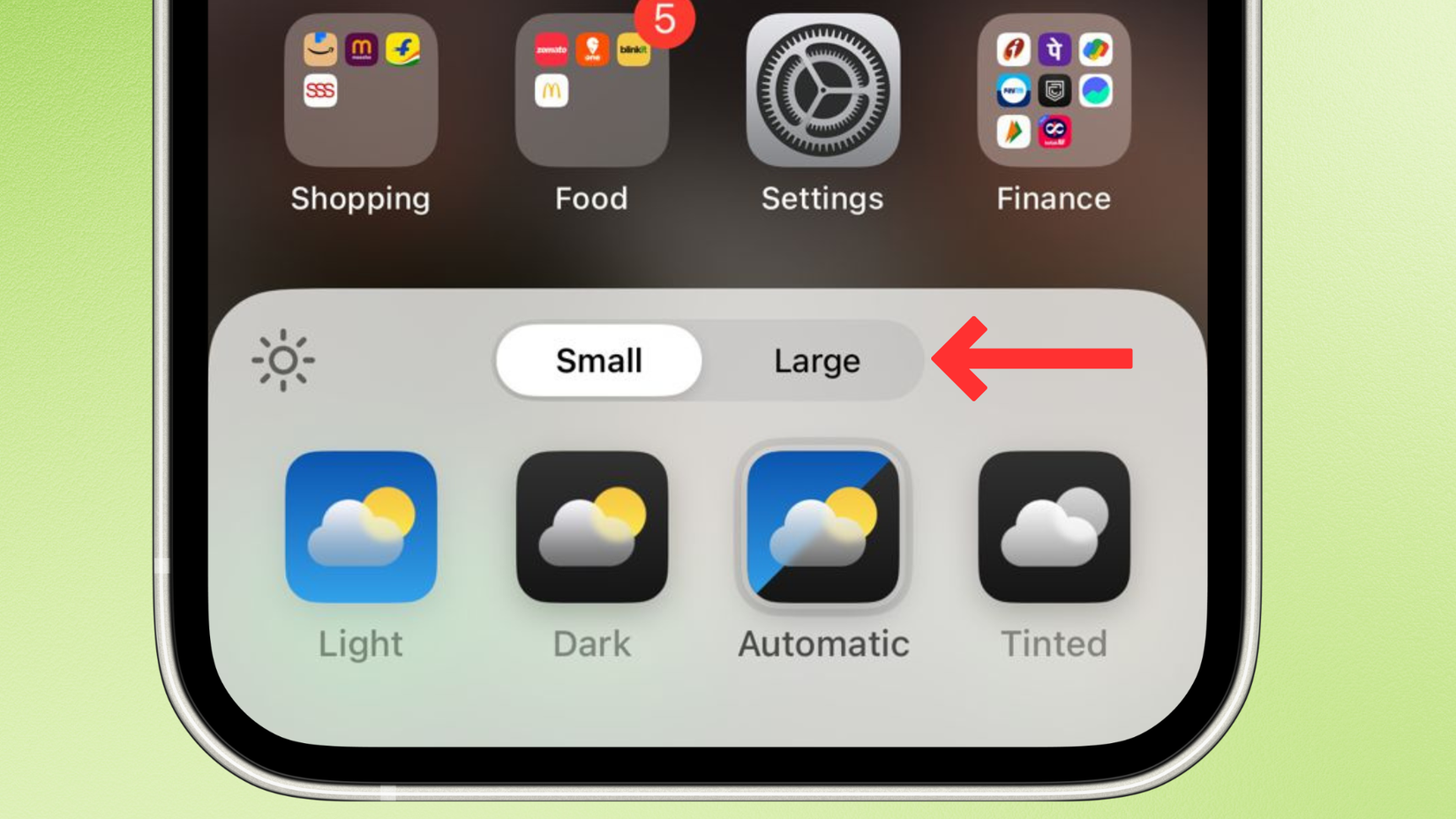 Screenshot of the iPhone's home Screen on iOS 18 with an arrow next to the Large icons button.