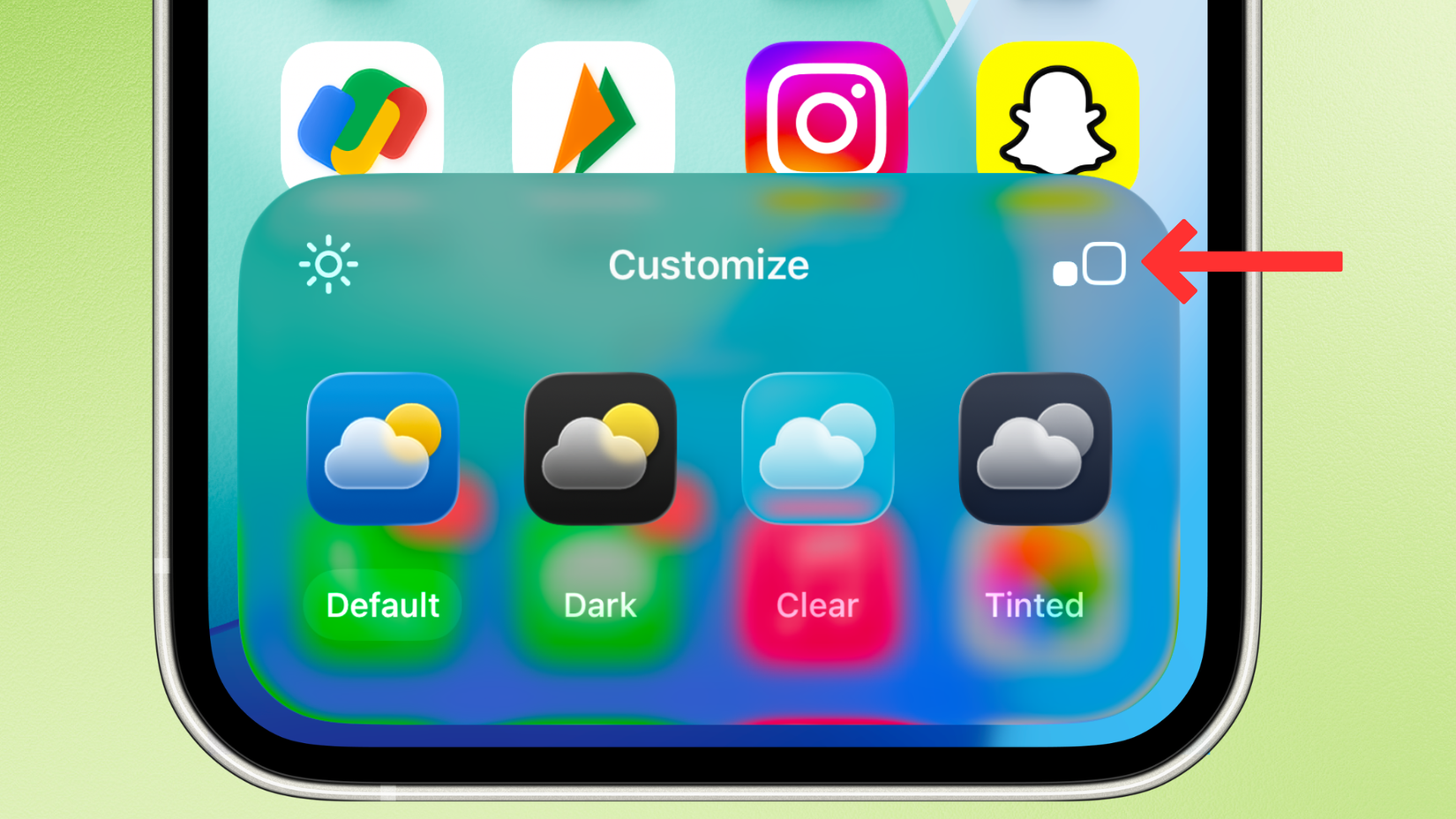 Screenshot of the iPhone's Home Screen on iOS 26, with an arrow next to the large icons button.