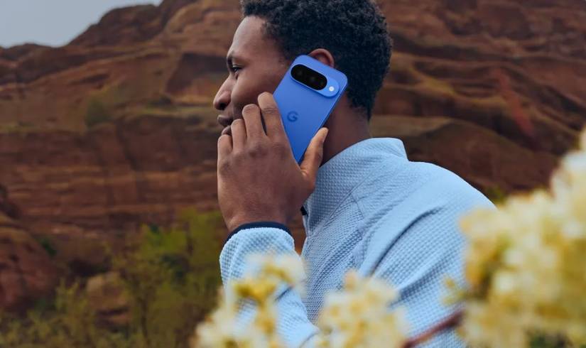 A man on a call with his Pixel 10.