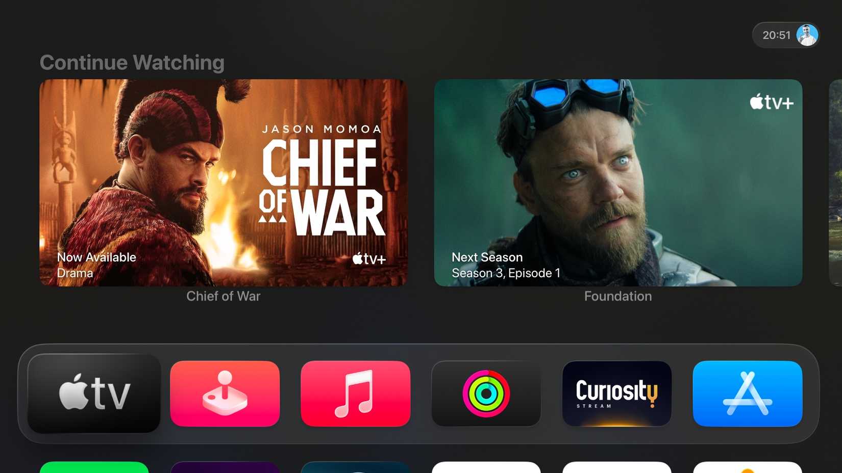 Apple TV home screen with the TV app icon selected.