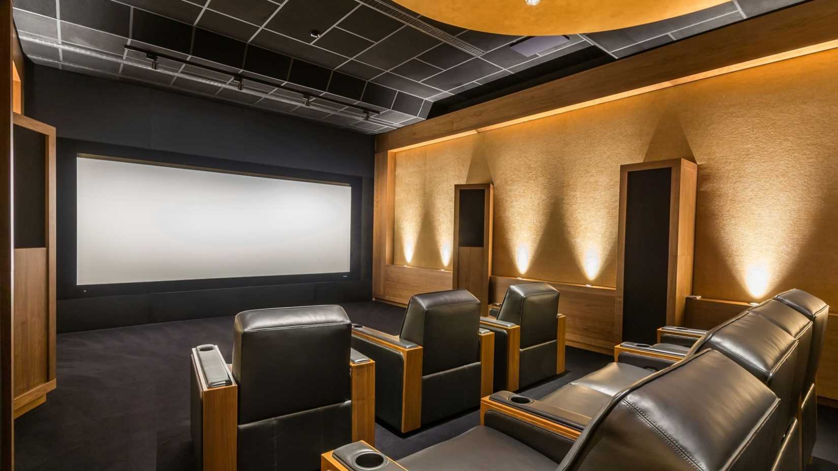 Stunning stylish home cinema. Luxury home theater design.